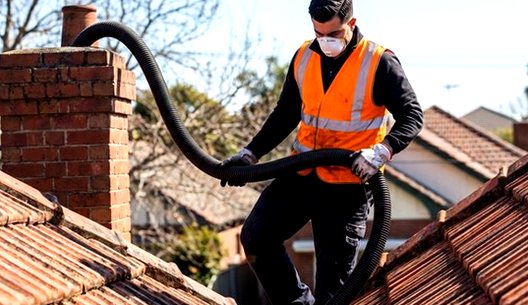 Vacuum hose toted along the roof ridge